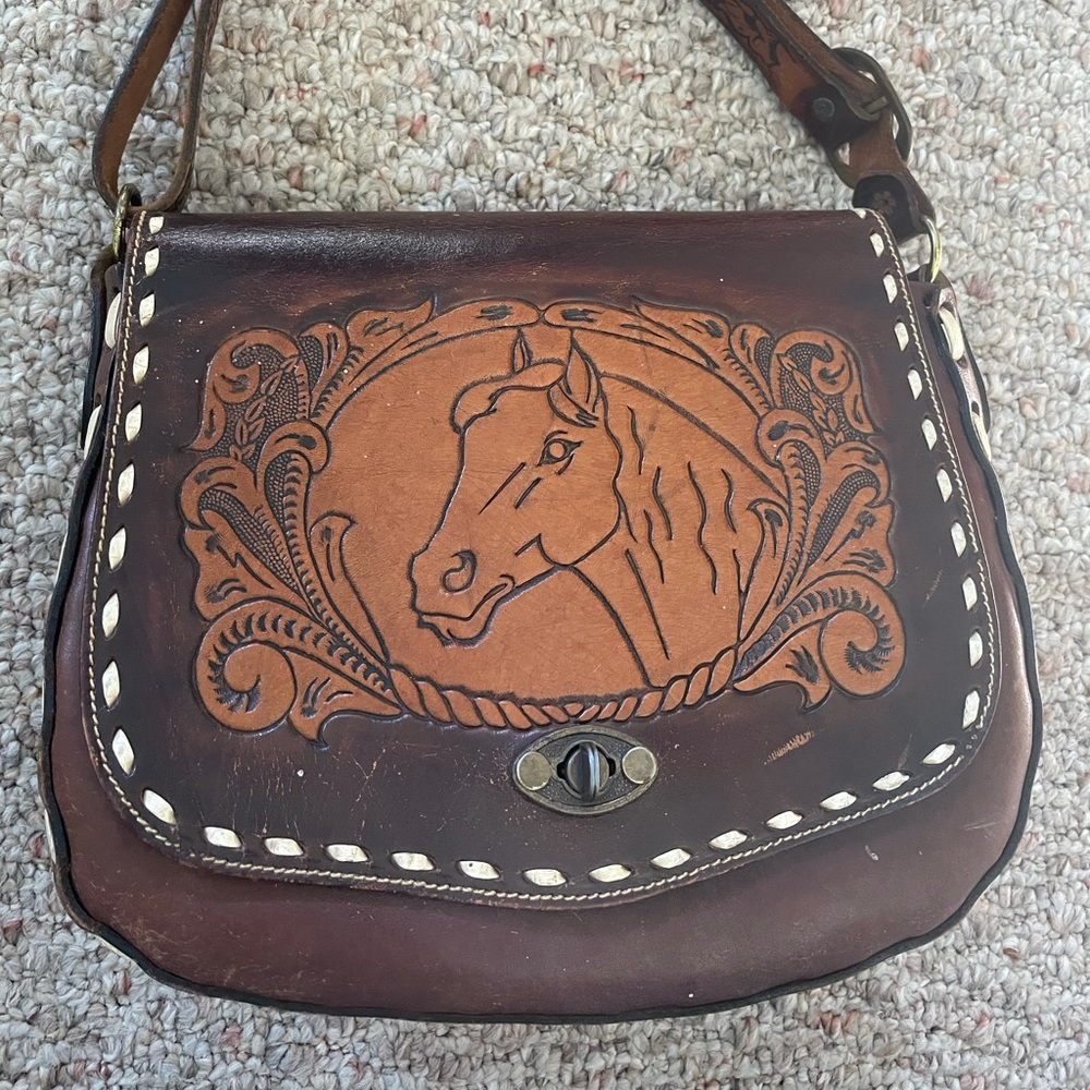 Hand tooled leather purse with horse